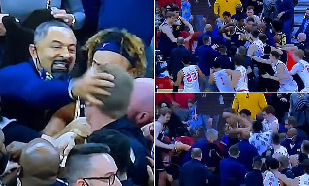 Michigan coach Juwan Howard appears to throw punch at Wisconsin assistant, brawl breaks out players