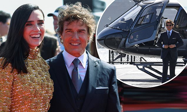 Tom Cruise arrives at Top Gun: Maverick premiere via HELICOPTER to the USS Midway in San Diego