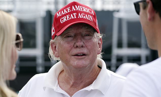 Trump tees off with son Eric and pros Bryson DeChambeau and Dustin Johnson at LIV series