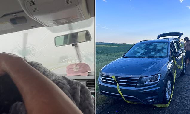 Terrifying moment massive hail storm smashes car's window in Canada as people duck for cover inside 