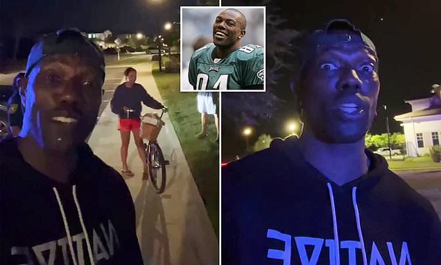 Terrell Owens' white neighbor is charged with lying to cops over racially charged confrontation