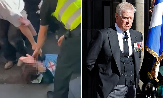 Two men, 34, are charged with assault after heckler, 22, who 'verbally abused Prince Andrew'