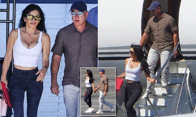Jeff Bezos and girlfriend Lauren Sanchez arrive in Los Angeles after his ex-wife files for divorce