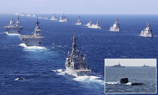Japanese PM says it needs to strengthen military as North Korea steps up missile-firing programme