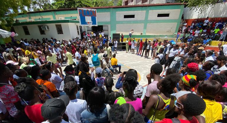 Young Haitians bond over sports, earrings and pineapple jam
