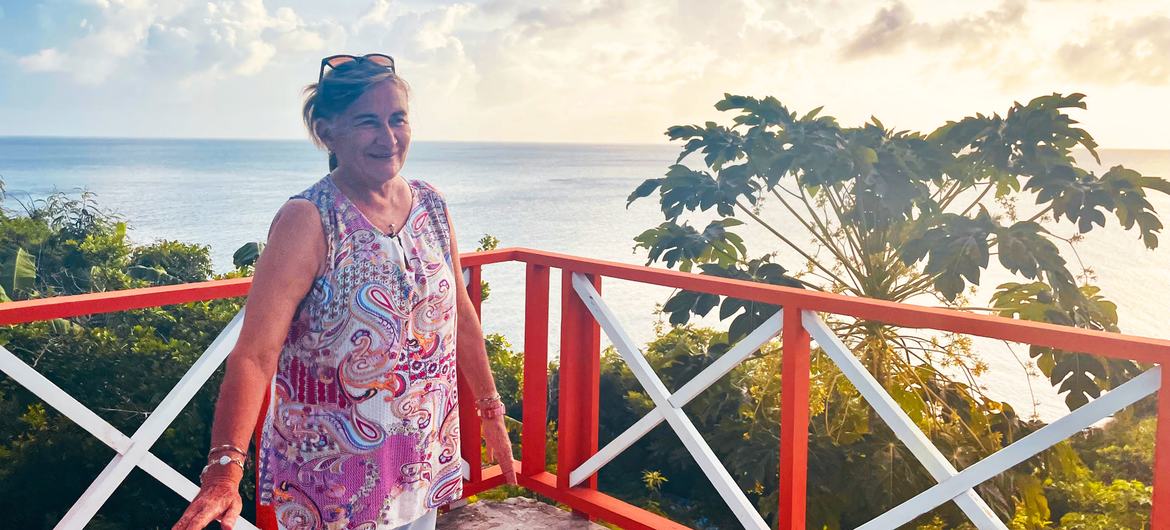 Marcela Cano stands on the re-built deck of her house in Providencia. Marcela Cano stands on the re-built deck of her house in Providencia.