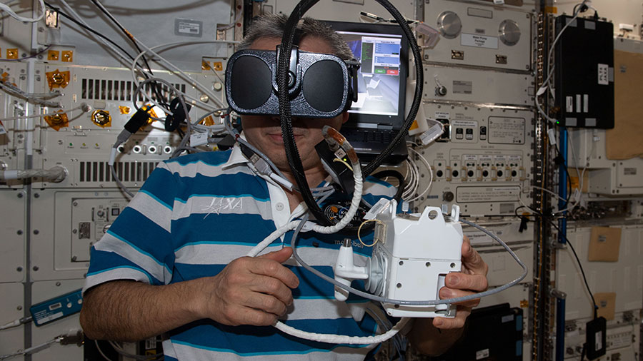 Crew Ready for Spacewalk and Conducts Biology, Physics Research